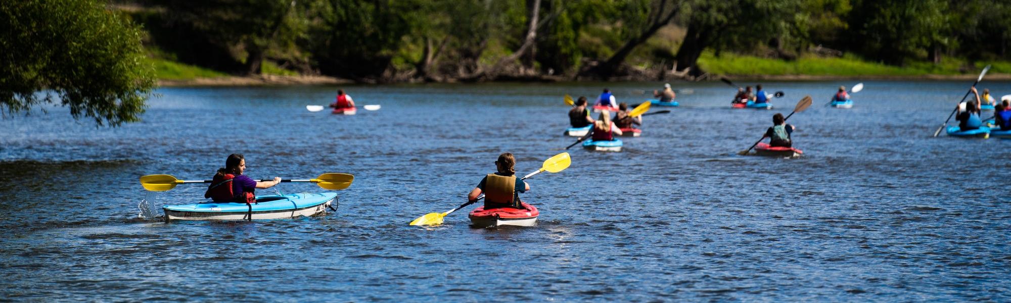 students kayaking